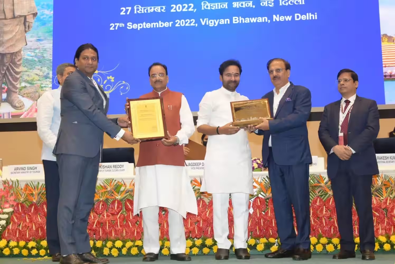 IEML CEO and chairman receiving awards at an official ceremony in New Delhi.